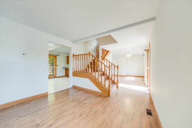 interior space featuring ceiling fan and light hardwood / wood-style flooring