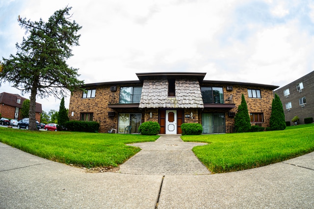 view of front of home with a front yard