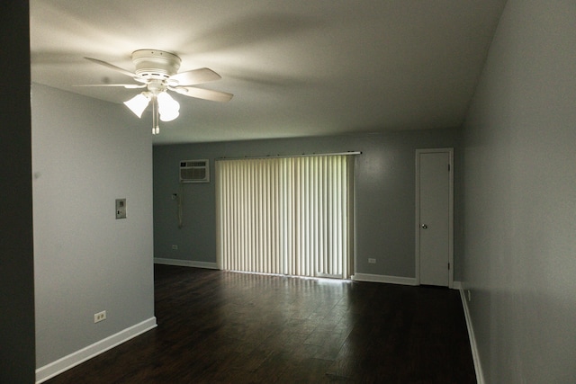 unfurnished room featuring ceiling fan, wood-type flooring, and a wall unit AC