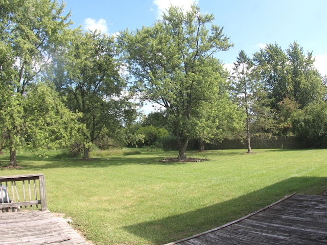 view of yard with a wooden deck