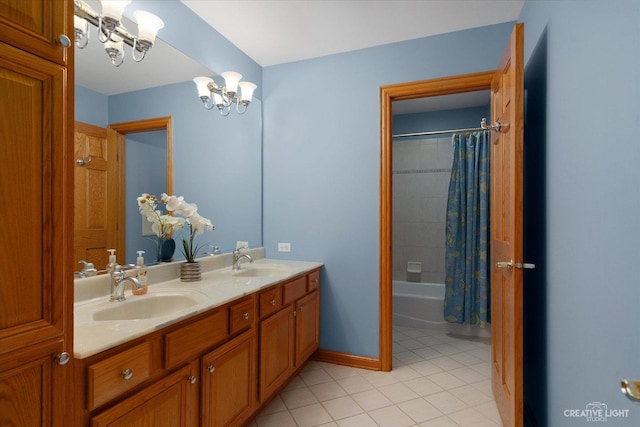 bathroom with shower / bath combination with curtain, tile patterned flooring, vanity, and an inviting chandelier