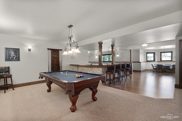 game room featuring pool table, carpet floors, and bar area