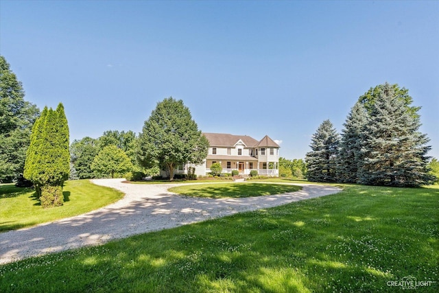 view of front of property with a front lawn