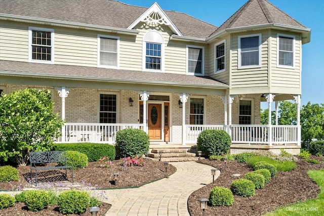 victorian house with covered porch