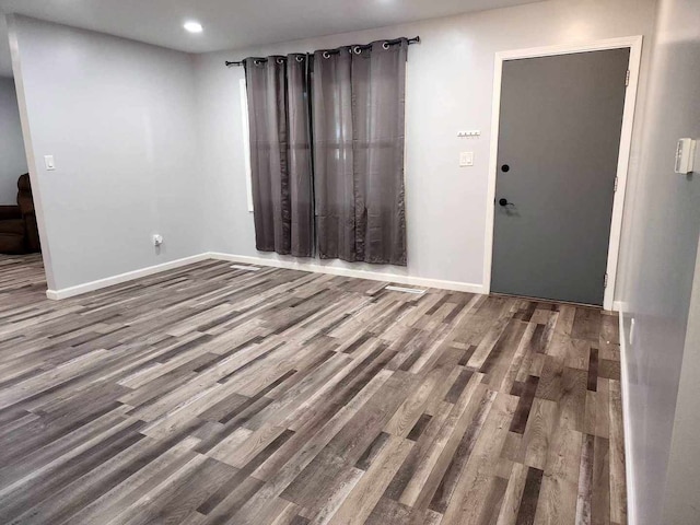 empty room featuring hardwood / wood-style floors