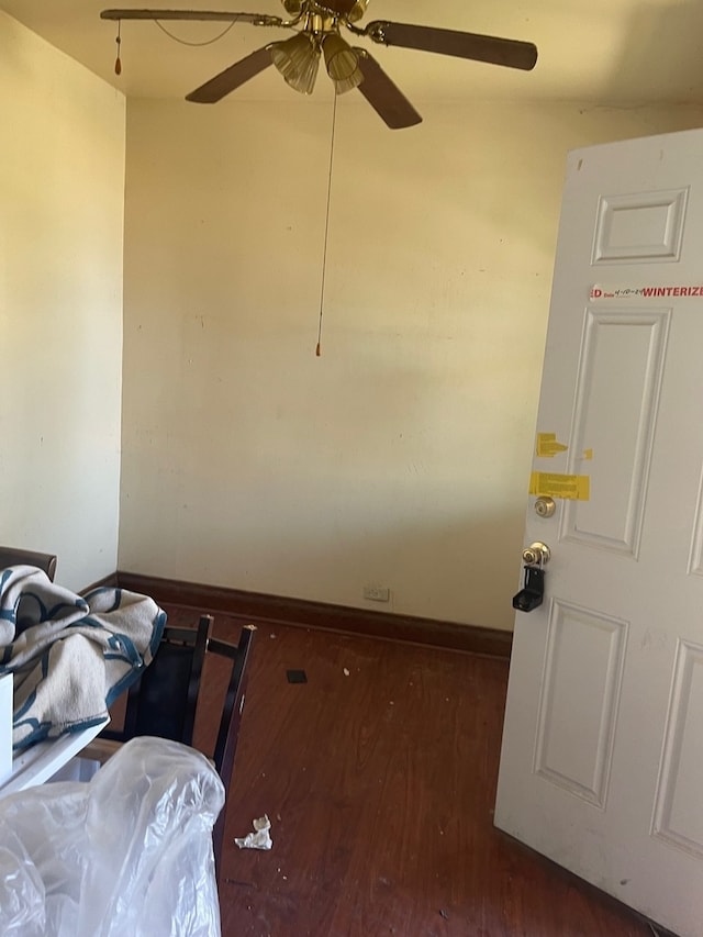 miscellaneous room featuring ceiling fan and wood-type flooring