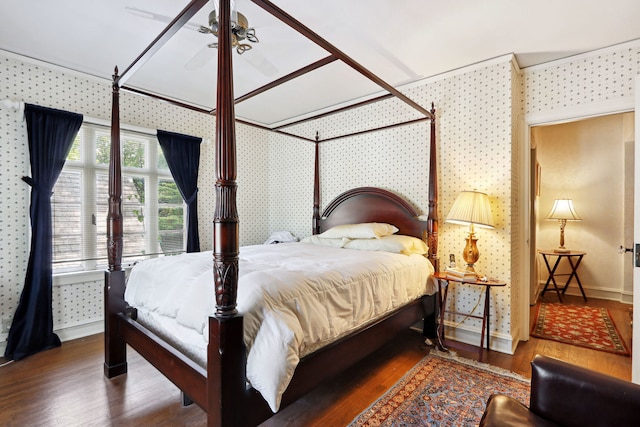 bedroom featuring ceiling fan and wood-type flooring