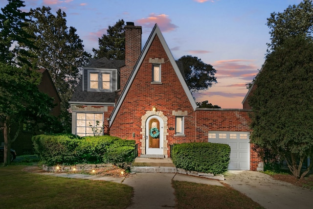 tudor house with a garage