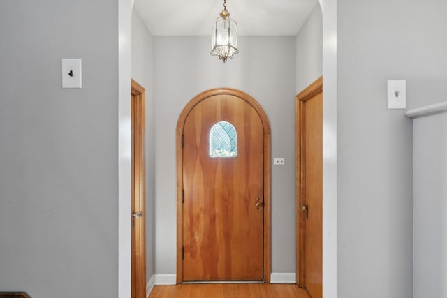 foyer entrance with light wood-type flooring