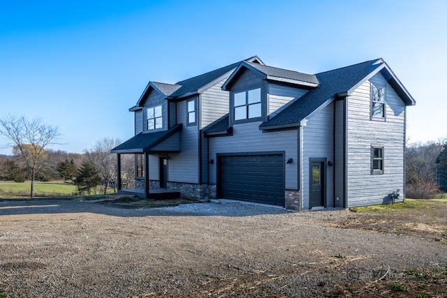 view of front of property with a garage