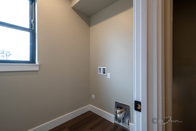 laundry area with hookup for a washing machine and dark hardwood / wood-style flooring