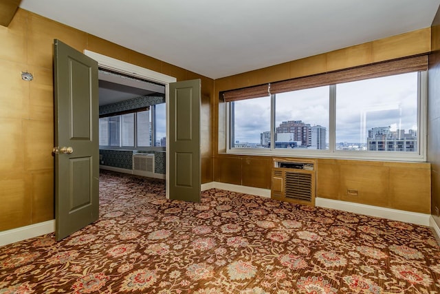 1440 N Lake Shore Dr Unit 22Abcd, Chicago, IL 60610 - carpeted spare room with a city view, baseboards, and a healthy amount of sunlight