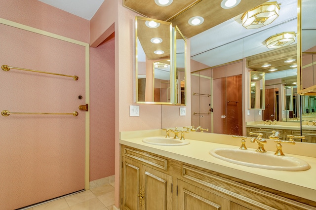 bathroom featuring tile patterned floors and vanity