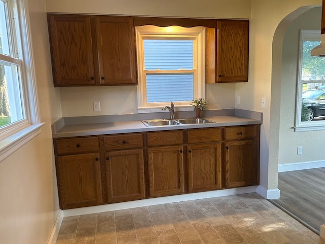 kitchen featuring sink and light wood-type flooring