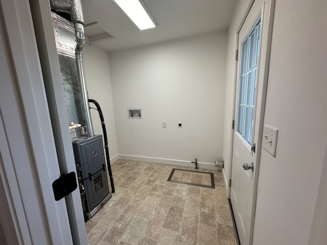 clothes washing area featuring light tile patterned flooring, electric dryer hookup, and washer hookup