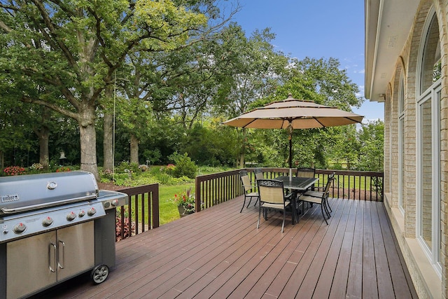 wooden deck with area for grilling