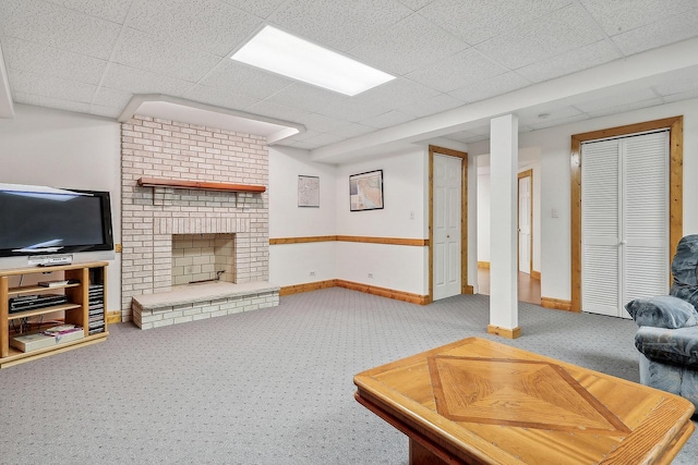 carpeted living room featuring a brick fireplace