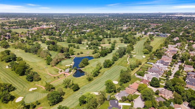 bird's eye view with a residential view, golf course view, and a water view