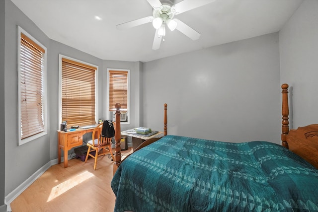 bedroom featuring ceiling fan and light hardwood / wood-style floors