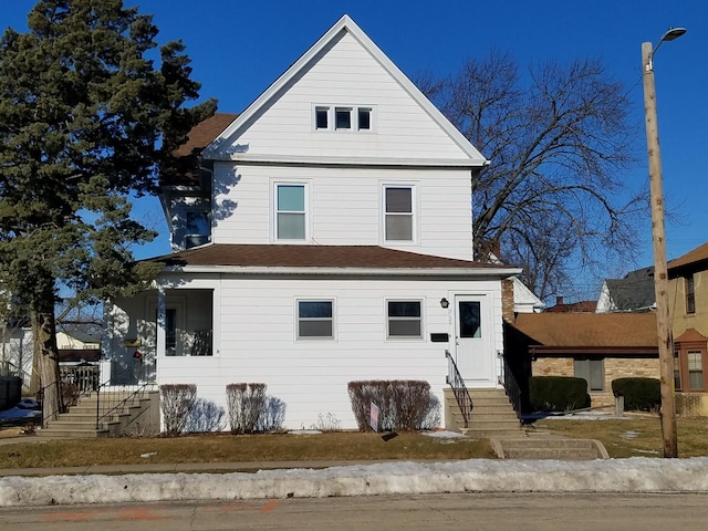 view of front of home with entry steps