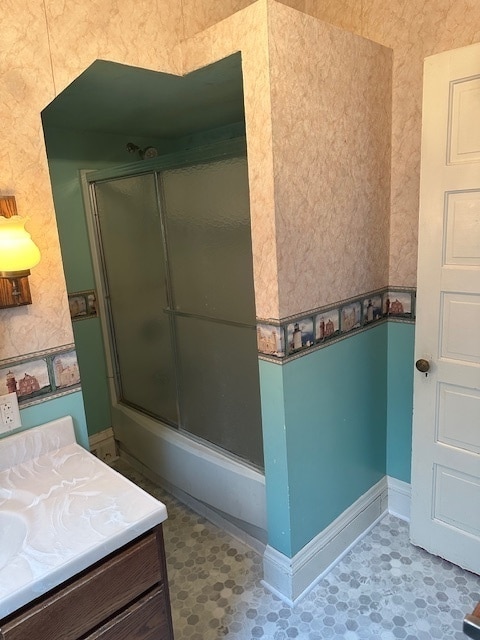 bathroom featuring tile patterned floors and vanity