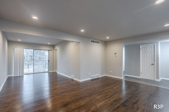 empty room featuring dark hardwood / wood-style floors