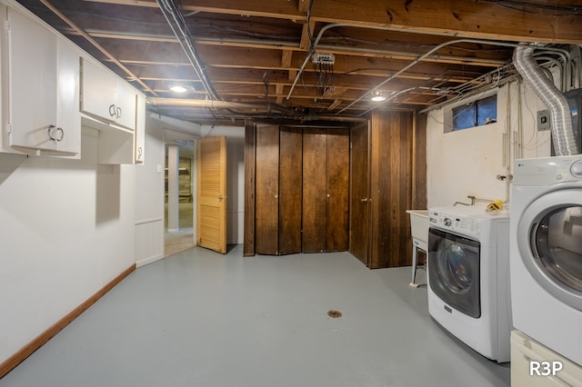 basement with separate washer and dryer