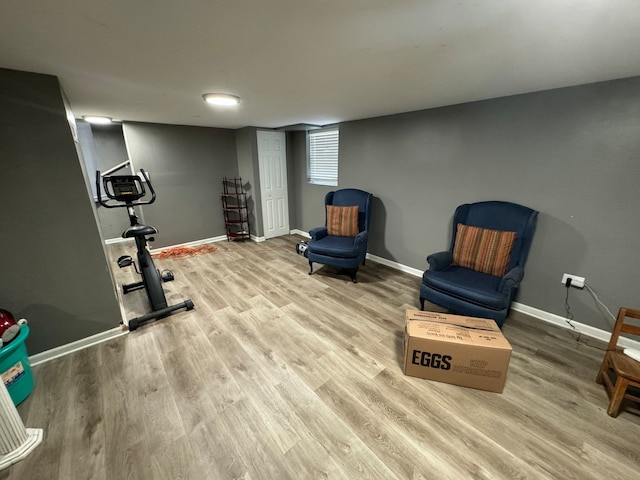 exercise area with hardwood / wood-style flooring