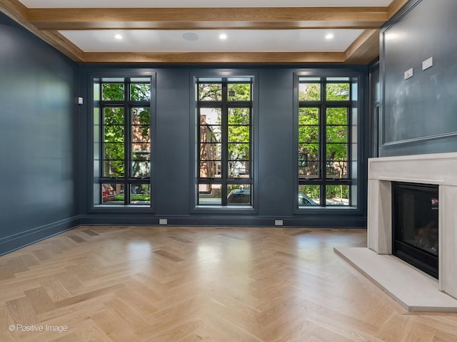 unfurnished living room featuring light parquet floors