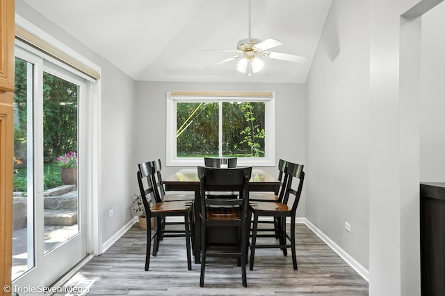 28629 W Ravine Dr, Barrington, IL 60010 - dining area featuring vaulted ceiling, wood finished floors, and ceiling fan