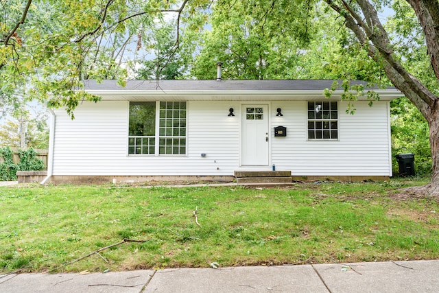 ranch-style house with a front yard