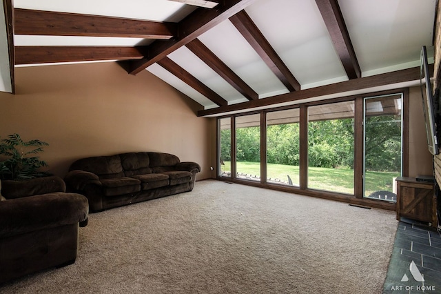 living room featuring vaulted ceiling with beams and tile patterned floors