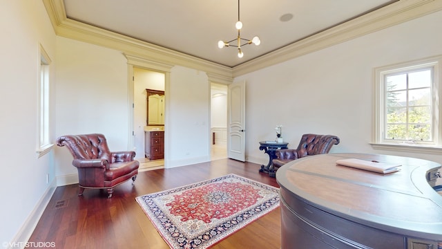 home office with a notable chandelier, dark hardwood / wood-style floors, and crown molding