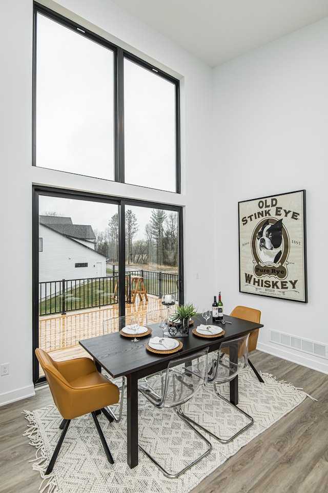 dining area featuring hardwood / wood-style flooring