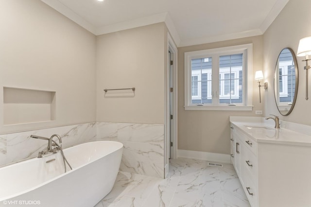 bathroom featuring a tub to relax in, vanity, tile walls, and crown molding