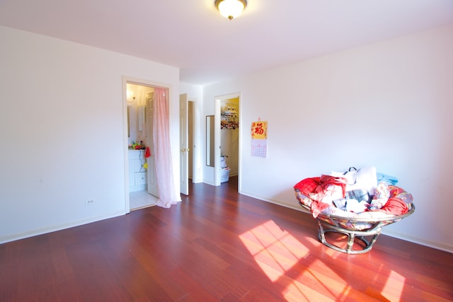 unfurnished room featuring dark hardwood / wood-style flooring