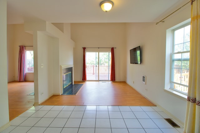 unfurnished living room featuring light hardwood / wood-style flooring