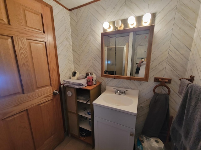 bathroom with vanity and an enclosed shower