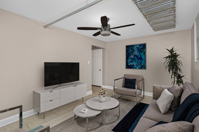 tiled living room with ceiling fan