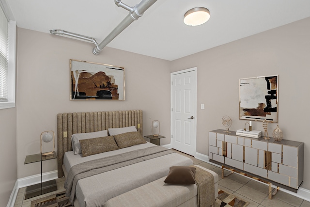 bedroom featuring tile patterned flooring