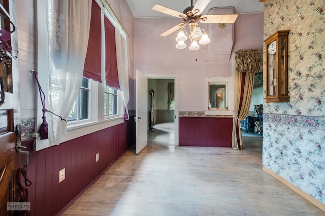 interior space with ceiling fan and light wood-type flooring