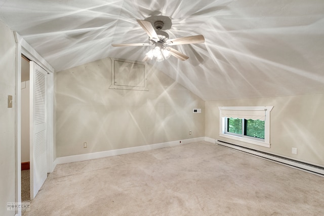 bonus room featuring ceiling fan, baseboard heating, lofted ceiling, and light colored carpet