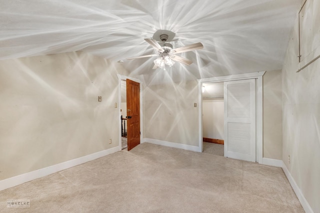 bonus room with baseboards and carpet floors