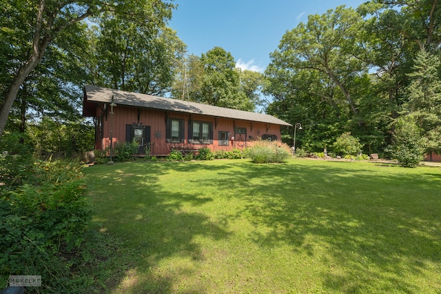 view of front of home with a front lawn