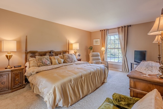 bedroom with light carpet