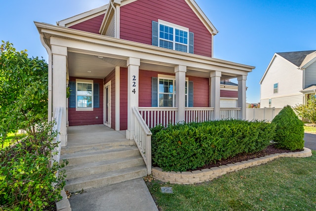 view of front of property featuring covered porch