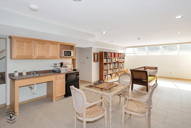 dining room featuring sink