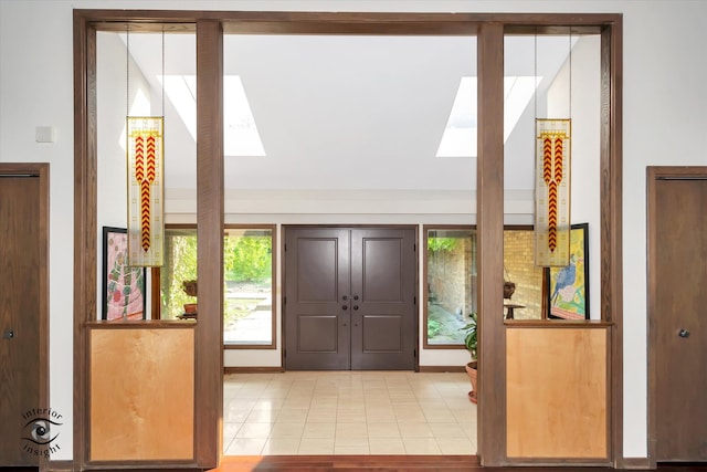 entryway featuring light tile patterned flooring