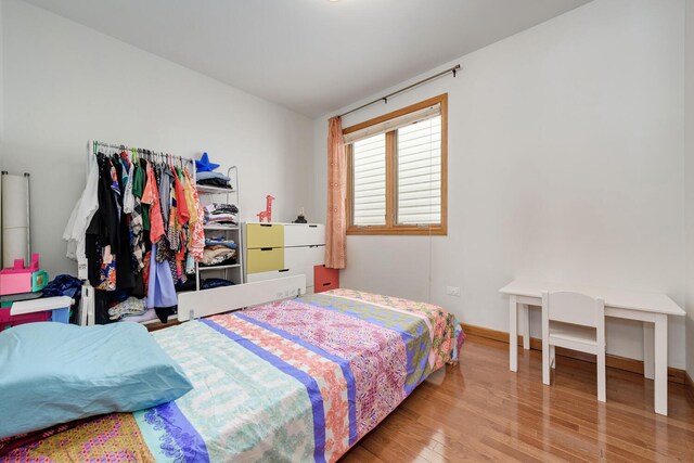 bedroom featuring light hardwood / wood-style floors