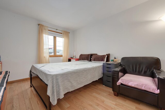 bedroom featuring light hardwood / wood-style flooring